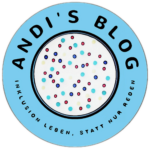 Das Logo von Andi's Blog. Blauer Kreis mit dem Text Andi's Blog, Inklusion leben, statt nur reden. In der Mitte ein heller Kreis mit bunten Punkten in verschiedenen Farben, welche die Inklusion darstellen sollen.